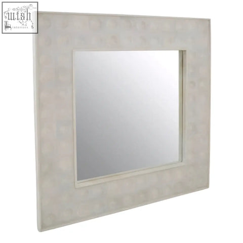 Square satara wall mirror with textured off-white frame made of natural bone or shell material for stylish walls