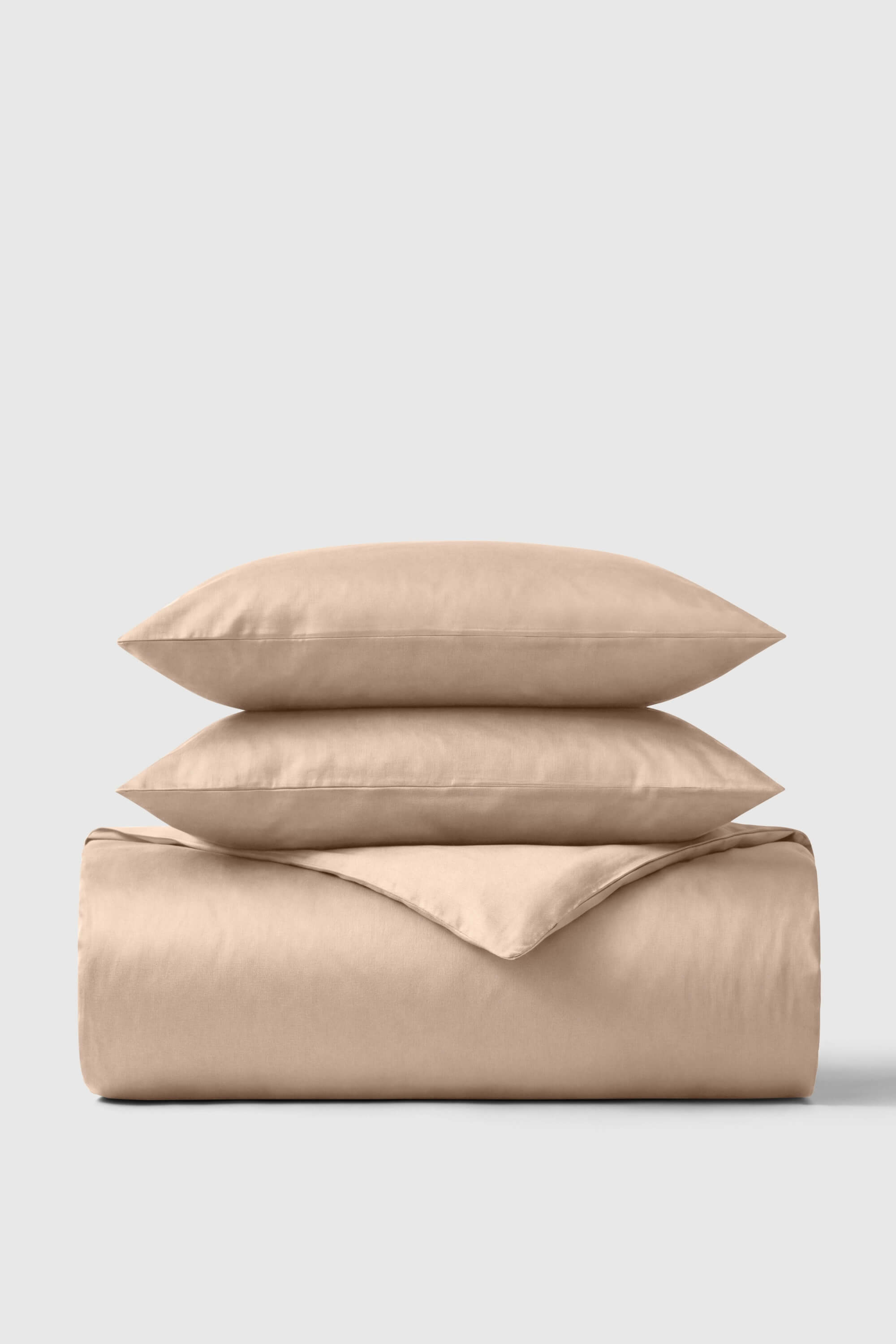 Beige satin sateen duvet cover set with matching pillowcases for a soft and elegant bedroom look