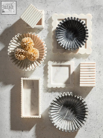 Savio large grey fluted marble bowl with scalloped edges and sunburst pattern perfect for compact surfaces
