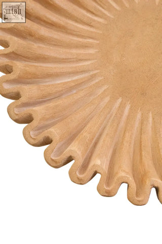 Beige sunburst-shaped ochre marble bowl with a textured fluted radial pattern perfect as a decorative marble bowl