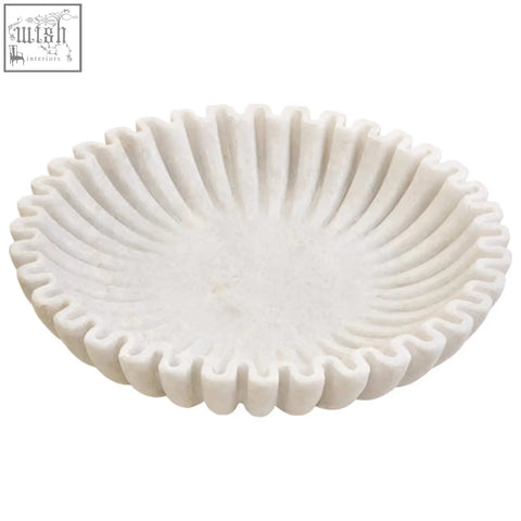 White marble bowl with fluted petal-like rim and smooth textured center perfect for serving or decor