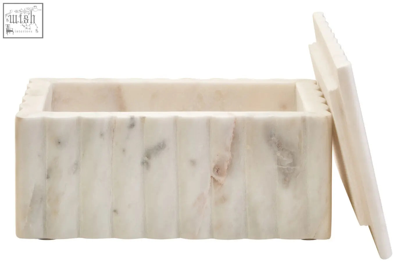Savio rectangular white marble box with cream color, subtle grey veining, and vertical grooves on its sides