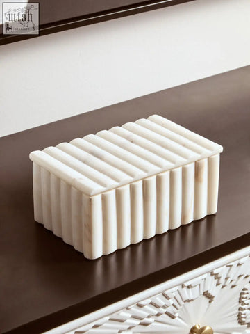 Savio rectangular white marble box with vertical ribbed detailing and subtle grey veining in marble box design