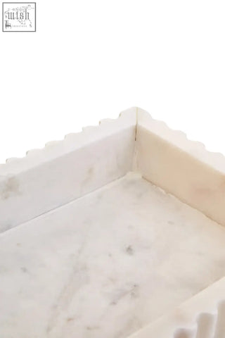 White marble fluted marble tray with scalloped edge and subtle gray veining for elegant serving or decor