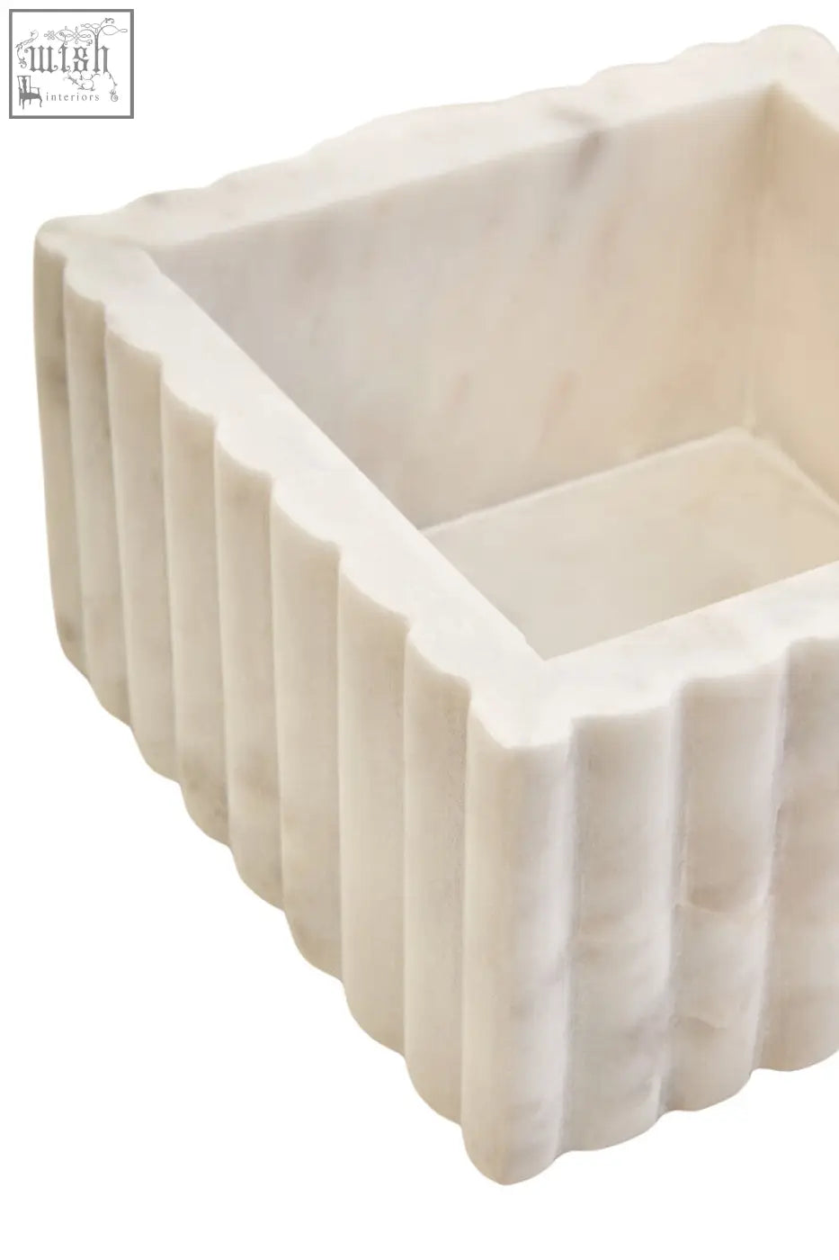 Savio square white fluted marble box is an off-white marble planter with a textured fluted marble exterior and subtle veining