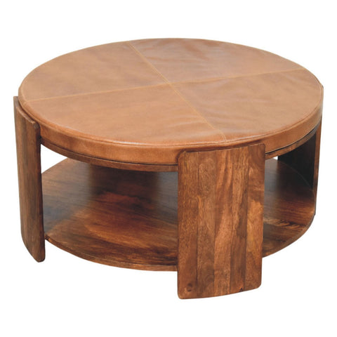 Savoy leather coffee table with round tan leather top and dark wood base featuring open lower shelf