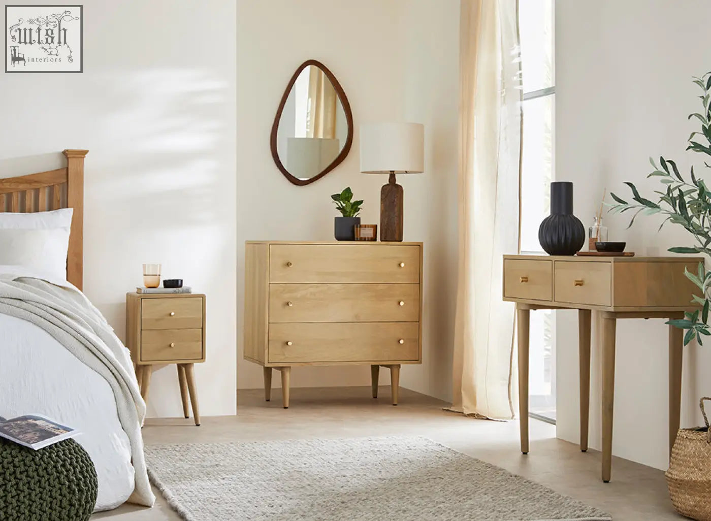 Scandinavian light oak oslo console with four drawers, solid wood glides, gold-tone knobs, and sustainable mango wood details
