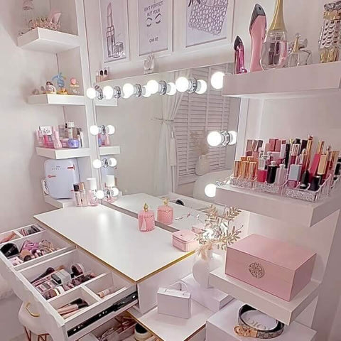 Pink rectangular makeup organizer box with gold emblem on top paired with scarlett large hollywood mirror 100x70cm
