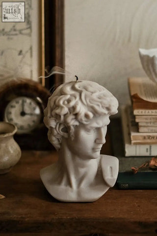 White wax scented david bust candle with detailed curly hair and sculpted facial features bust candle