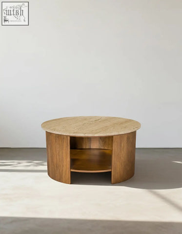 Schaefer round coffee table with travertine top and grooved wood sides with open shelf for living space storage