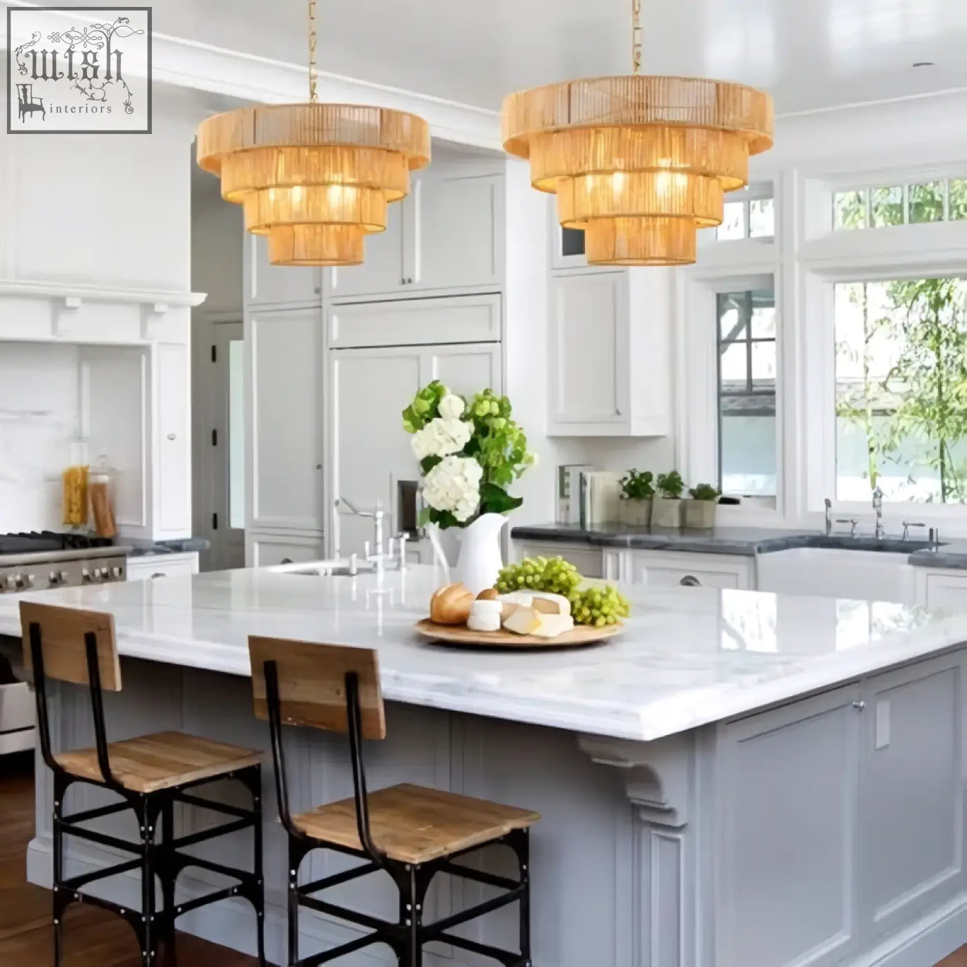 Golden tiered pendant light with woven rattan design hanging above kitchen island in brass boho style