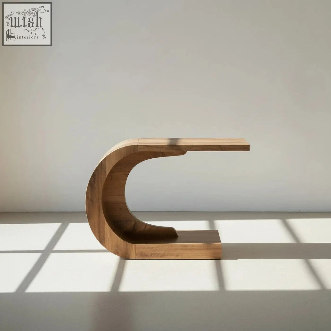 A sleek wooden crescent console table with natural finish and minimalist design perfect for modern spaces