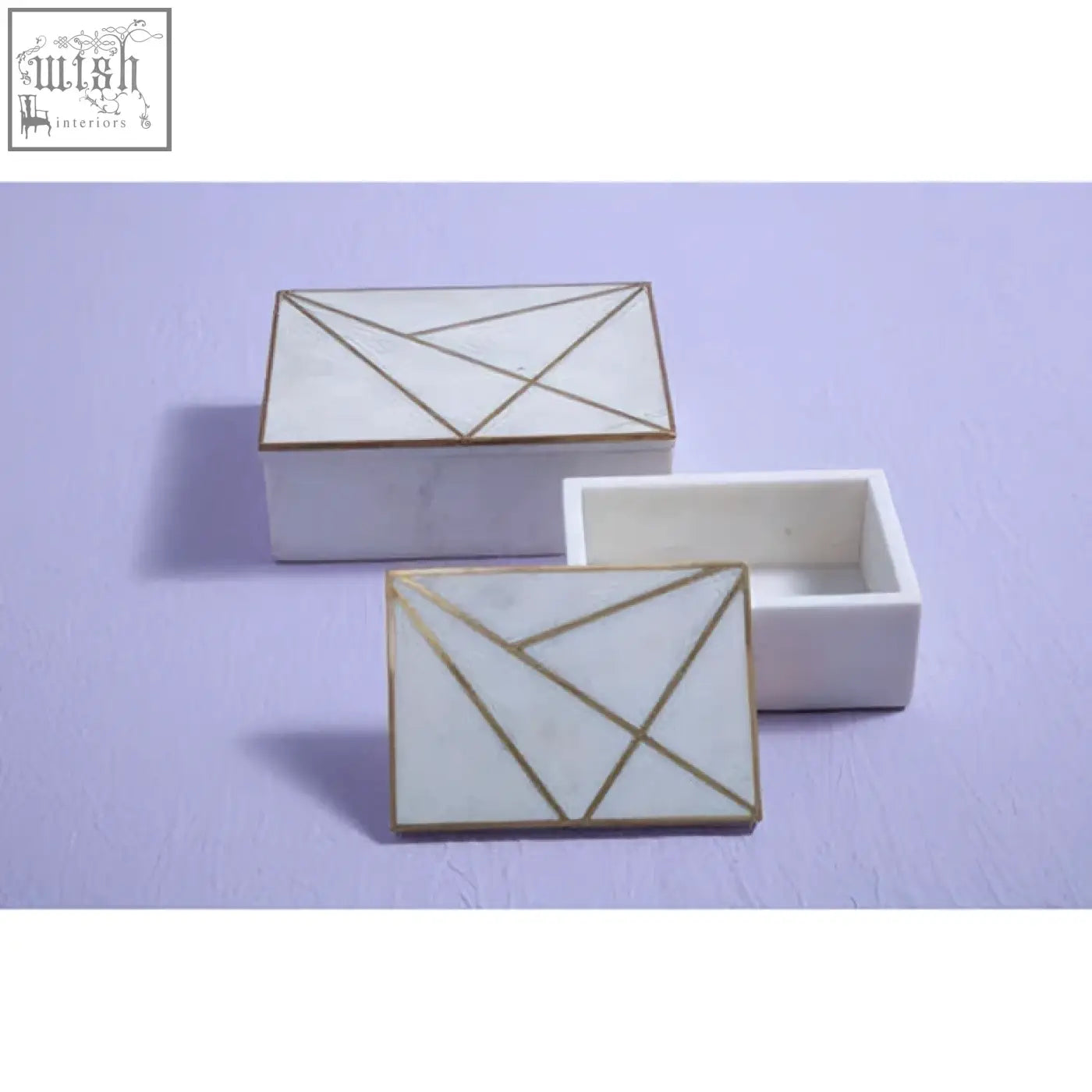 White marble trinket box with gold geometric lines perfect for stylish storage and decoration