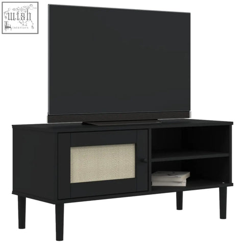 Black wood tv cabinet senja pinewood 106cm with cane-paneled door and open shelving for rustic charm