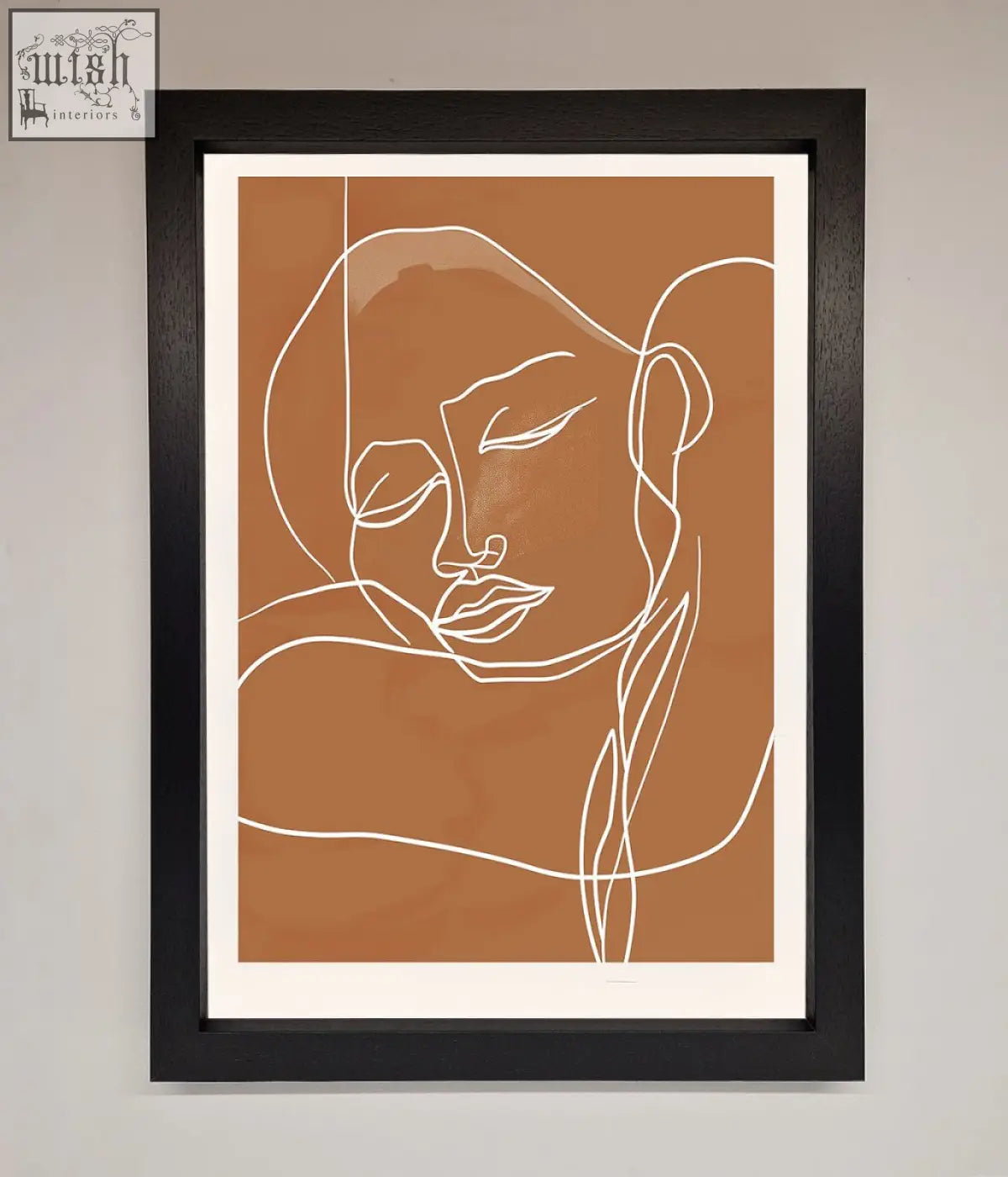 Minimalist sepia lines framed wall art with delicate white line art in black frame on warm terracotta background