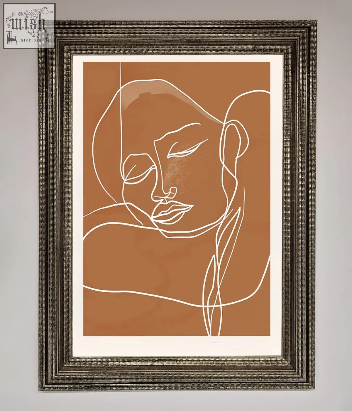 A minimalist sepia lines framed wall art with line art portrait in a dark textured frame perfect for modern decor