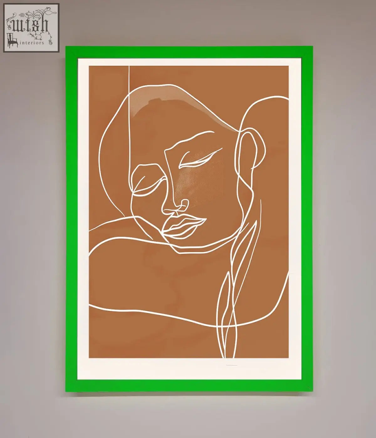 A minimalist white line-art portrait in a vibrant green frame on a warm brown background sepia lines framed wall art