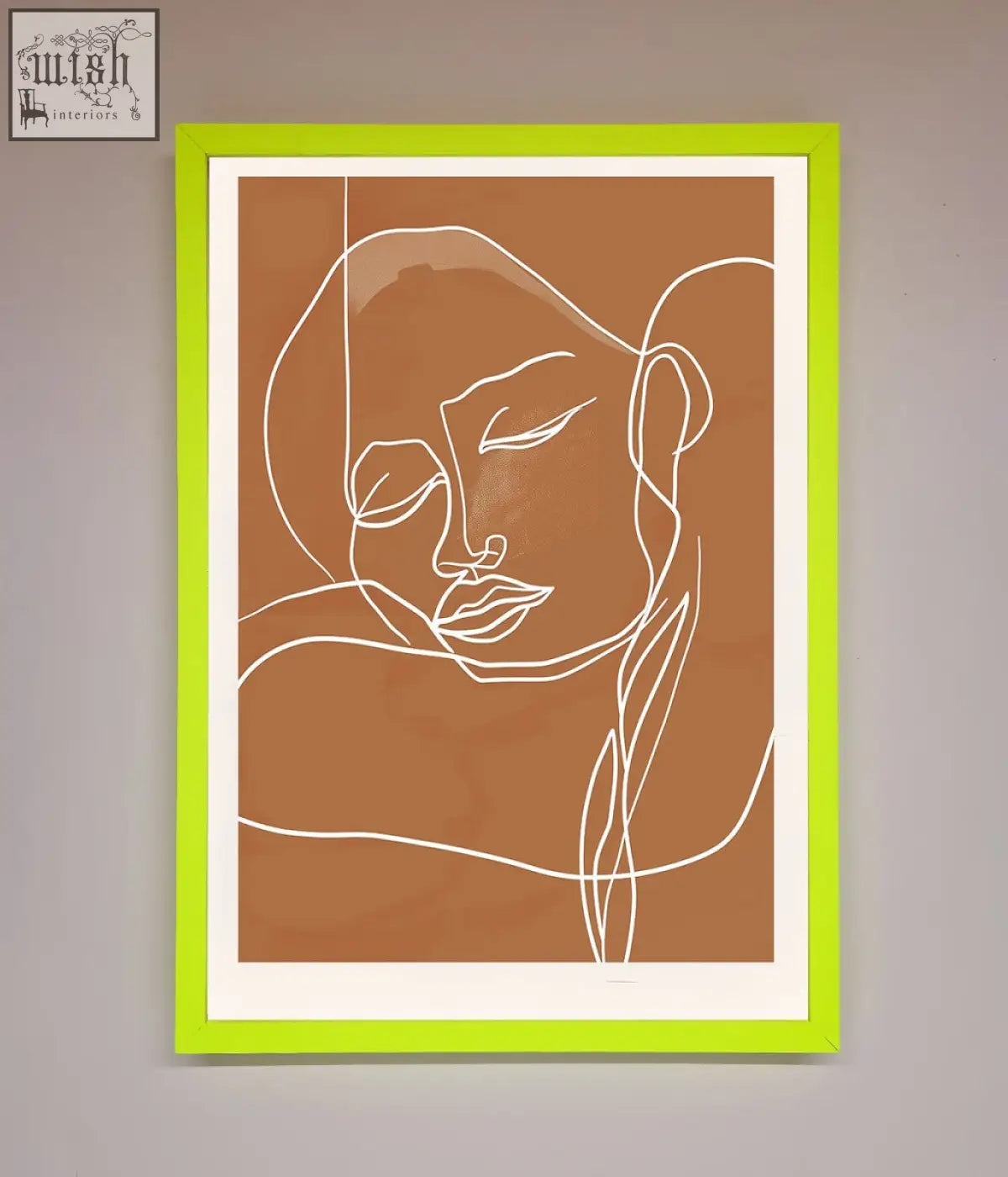 Minimalist sepia lines framed wall art with delicate white line art in a lime green frame on warm brown background