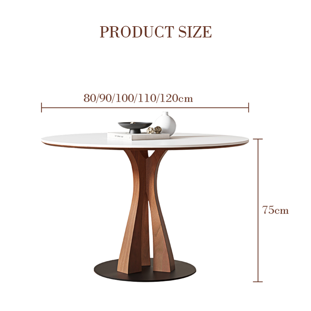 Seraphim round dining table with white marble top and light wood y-shaped base perfect for modern spaces