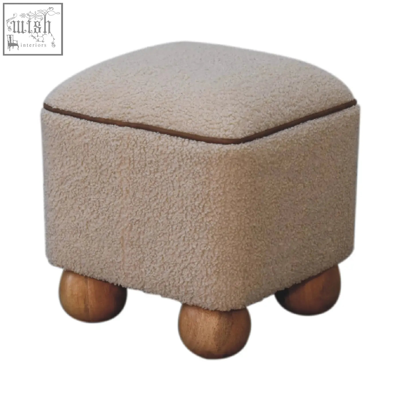 Beige fuzzy serenity footstool with handwoven upholstered design and unique ball feet and dark brown stitched trim