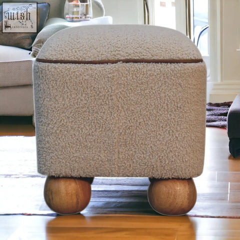 Beige fuzzy serenity footstool with handwoven upholstered design and unique rounded wooden ball feet