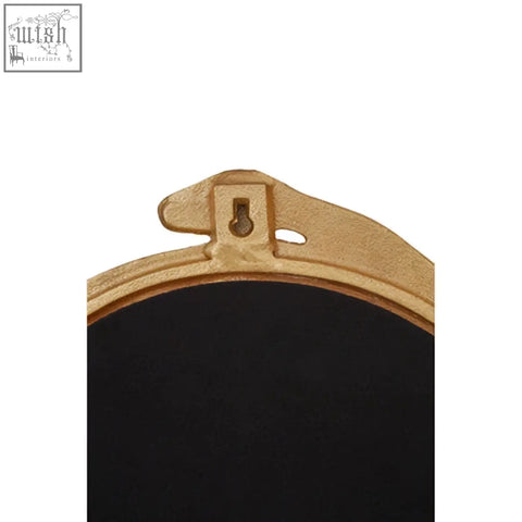 Gold-framed serpent wall mirror with dramatic texture and black reflective surface for stylish wall decor
