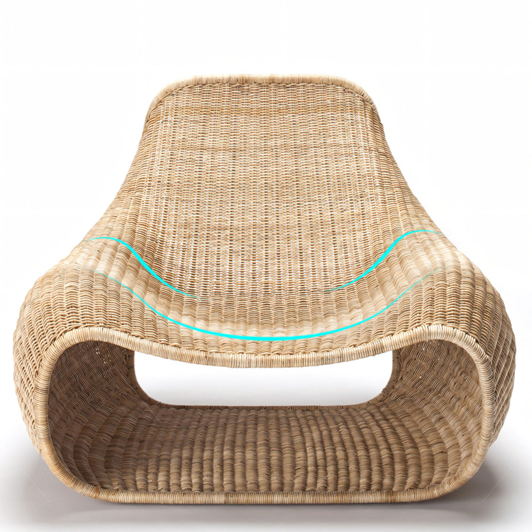 Serrano outdoor lounge chair with footstool in natural beige rattan and turquoise accent line perfect for relaxing