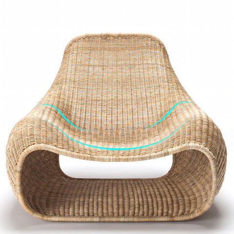 Serrano outdoor lounge chair with footstool in natural beige rattan and turquoise accent line perfect for relaxing