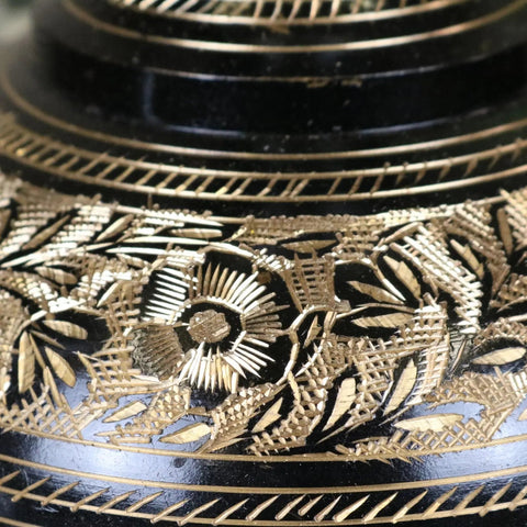 Black lacquered etched brass vase with intricate gold leaf floral patterns part of set of 2 black etched brass vases