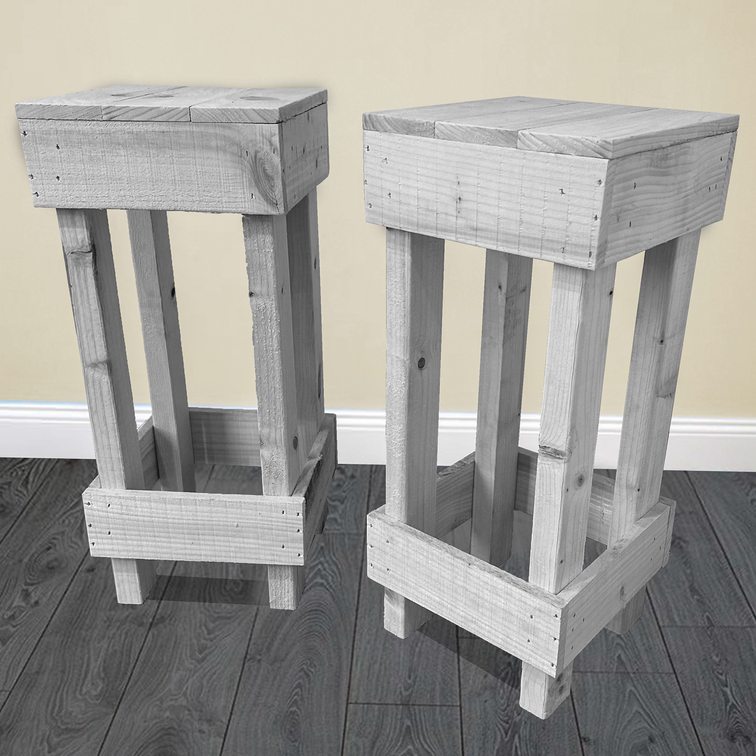 Set of 2 rustic wooden bar stools with a simple sturdy design whitewashed finish and visible wood grain