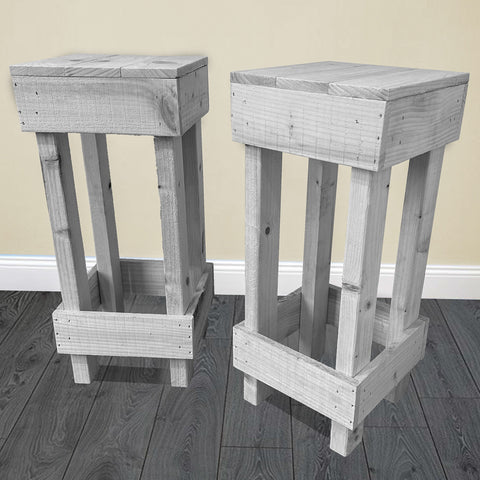 Set of 2 rustic wooden bar stools with a simple sturdy design whitewashed finish and visible wood grain