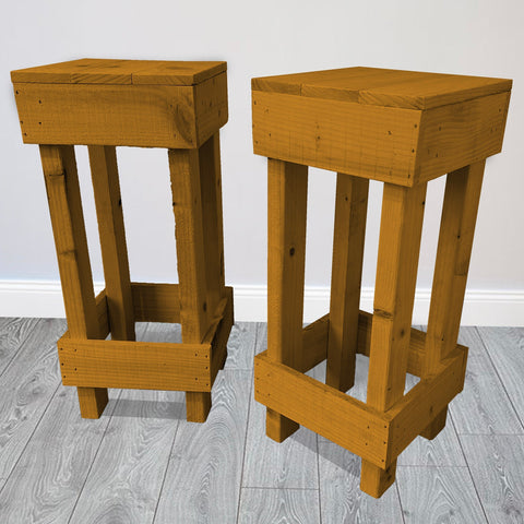 Set of 2 rustic wooden bar stools with warm natural finish and visible wood grain perfect for kitchen or bar seating