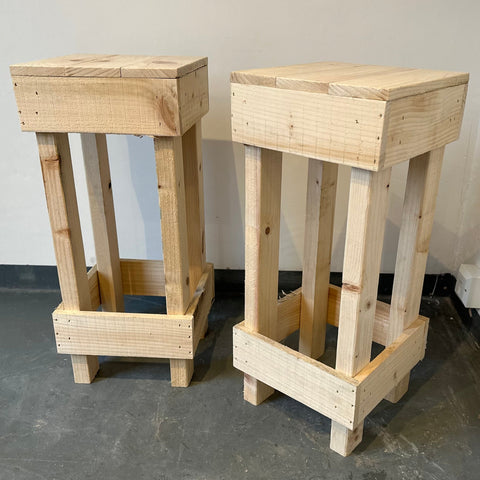Set of 2 rustic wooden bar stools with light-colored wood and sturdy pallet design for casual seating