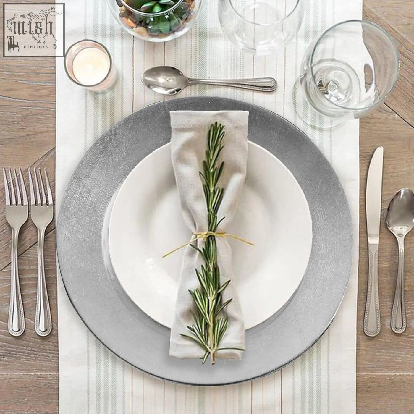 Silver-toned ceramic charger plates with matte distressed finish and concentric ridges to protect table surfaces