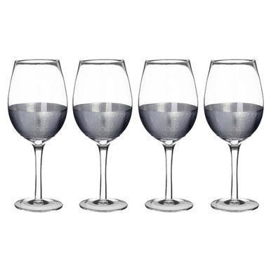 Set of four apollo large wine glasses clear glass with slender stems filled halfway with dark liquid