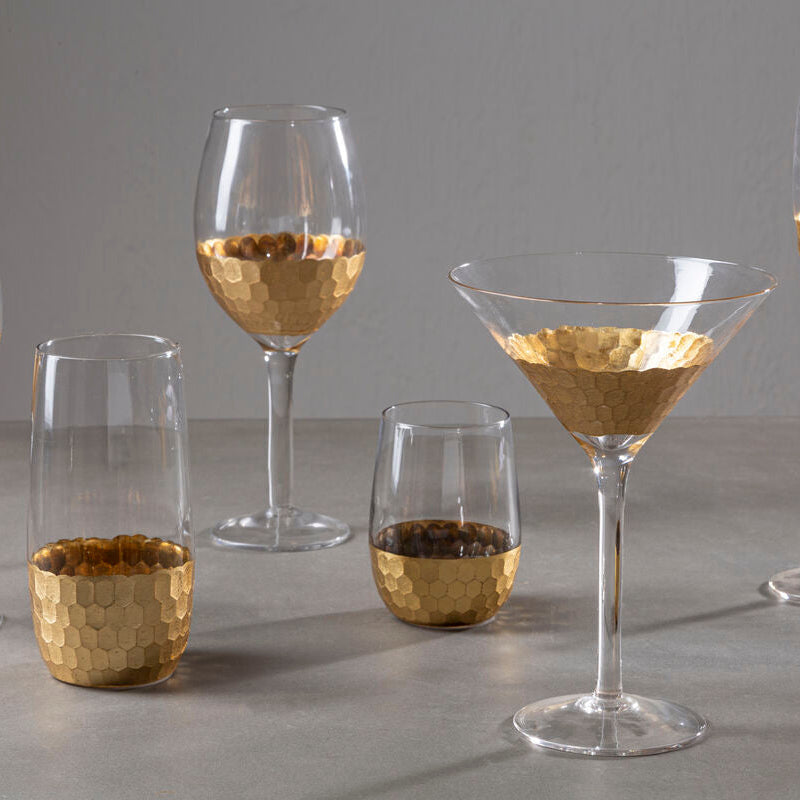 Set of four astrid large wine glasses with clear glass and hammered gold hexagonal pattern on the lower portion