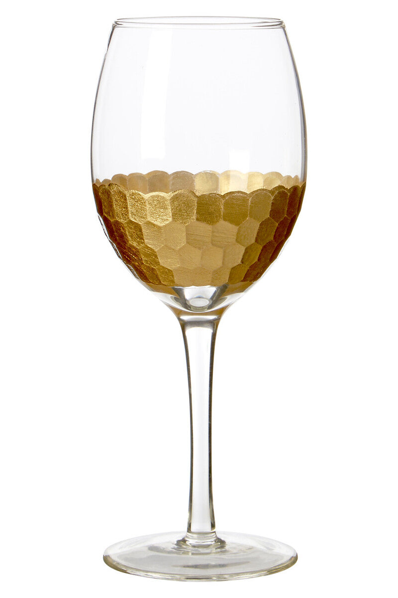 A clear astrid small wine glass with a gold honeycomb patterned band near the base in a set of four small wine glasses