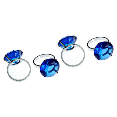 Set of five blue gemstone rings with silver bands styled like sapphire diamante napkin rings for elegant table settings