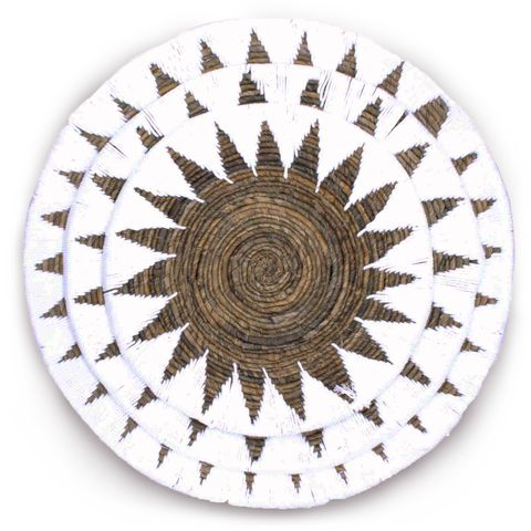 Handwoven seagrass bowls set of three with sunburst pattern in natural brown and cream for wall art decor
