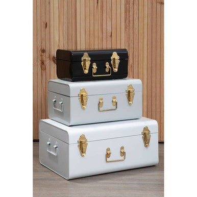 Stacked vintage-style metal storage trunks in white grey and black with gold-tone hardware set of three monochrome storage trunks