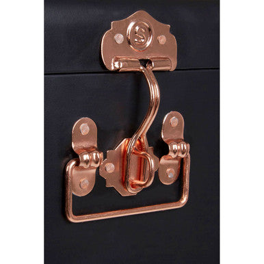Copper-toned metal latch and handle on black storage trunks set perfect for stylish black storage solutions