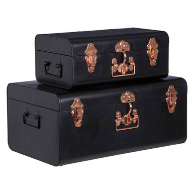 Set of two black metal storage trunks with copper hardware and vintage-style latches for stylish black storage