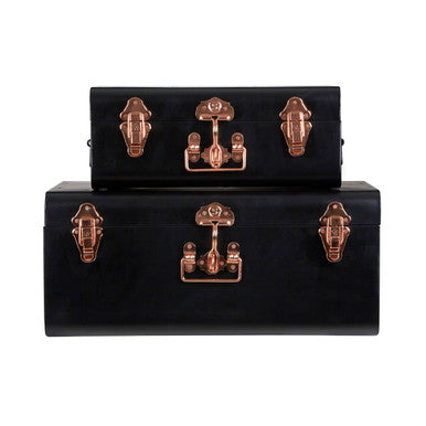 Set of two black storage trunks with copper metal latches and handles perfect for stylish black storage solutions