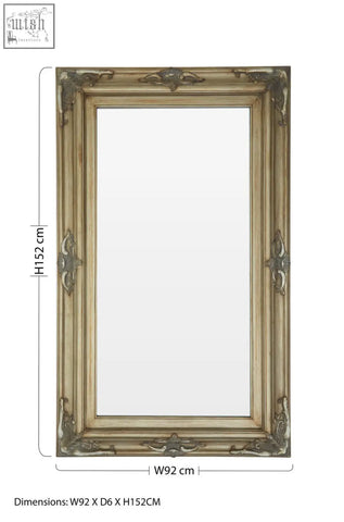 Antique-style sevan wood frame wall mirror with ornate distressed gold and silver-toned wood frame and intricate carvings