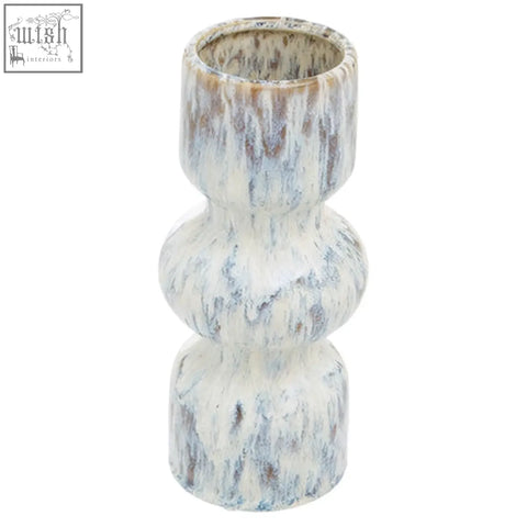 A white ceramic medium speckled vase with gray and blue glaze and three stacked rounded sections