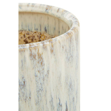 A cylindrical ceramic shai small planter with a distressed cream and gray mottled finish perfect for small plants