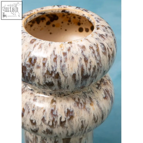 Creamy off-white ceramic small speckled vase with brown and black glaze in stacked rounded tiers called shai small speckled vase