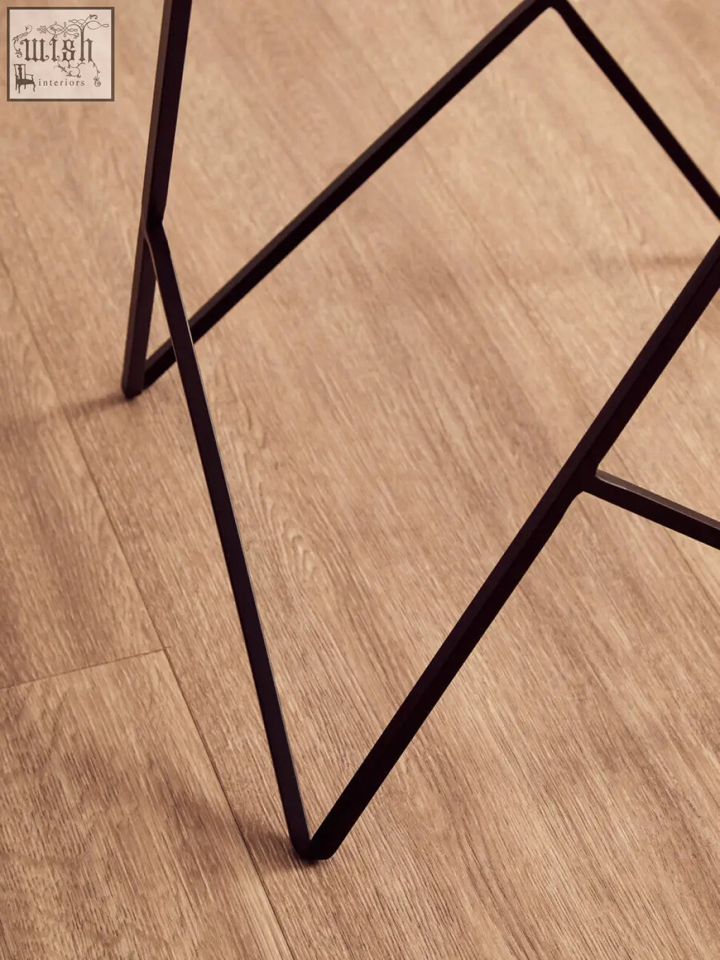 Legs of shalimar marble top square side table with black iron base and minimalist geometric iron frame design