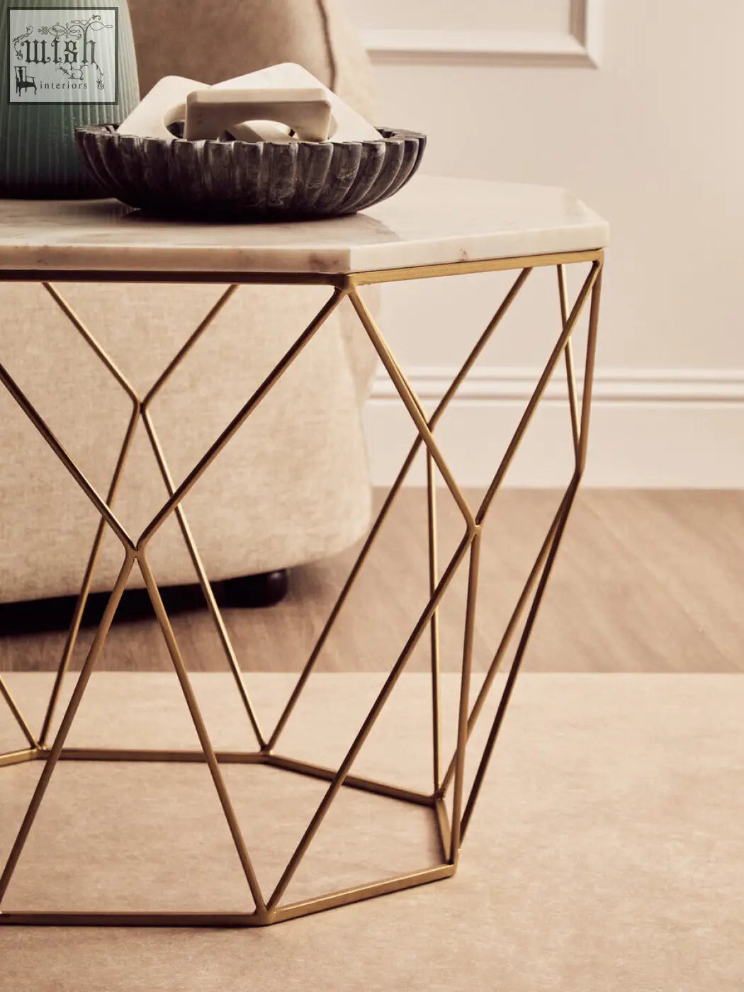 Gold geometric metal side table with an octagon white marble top perfect as a white marble coffee accent piece