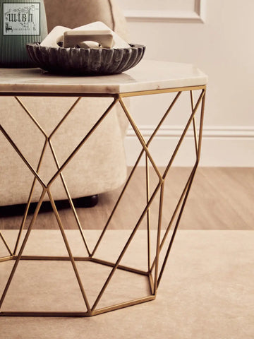 Gold geometric metal side table with an octagon white marble top perfect as a white marble coffee accent piece
